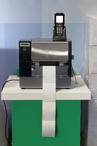 depositphotos_194568308-stock-photo-barcode-label-printer-scanner-distribution